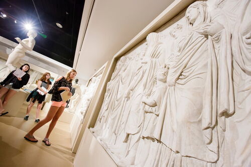 A student looks at artwork at Spurlock Museum